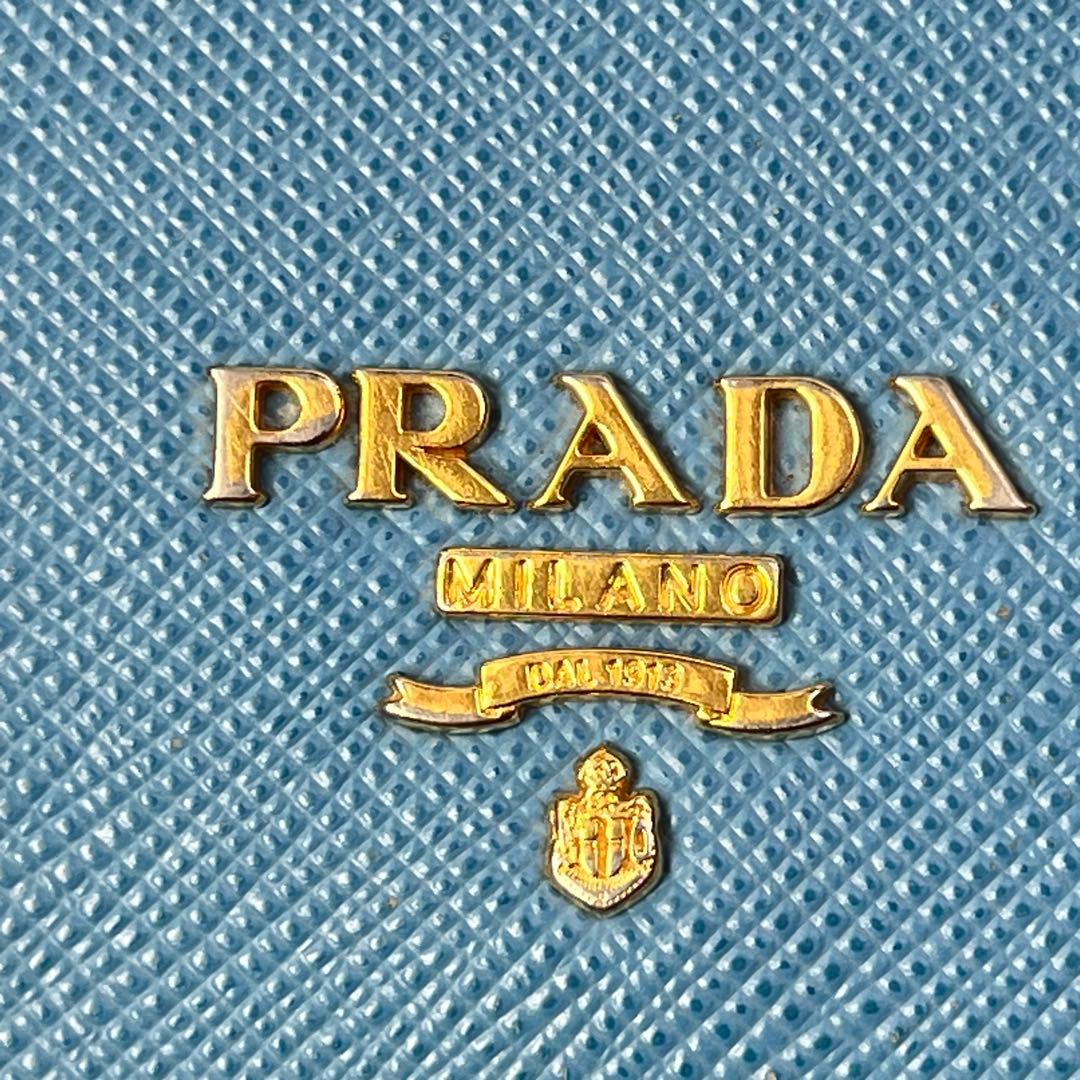 良品✨PRADA サフィアーノ　メタルロゴ　ライトブルー　レディース　長財布