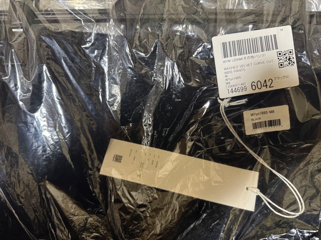 パンツ WASHED VELVET CURVE CUT WIDE PANTS