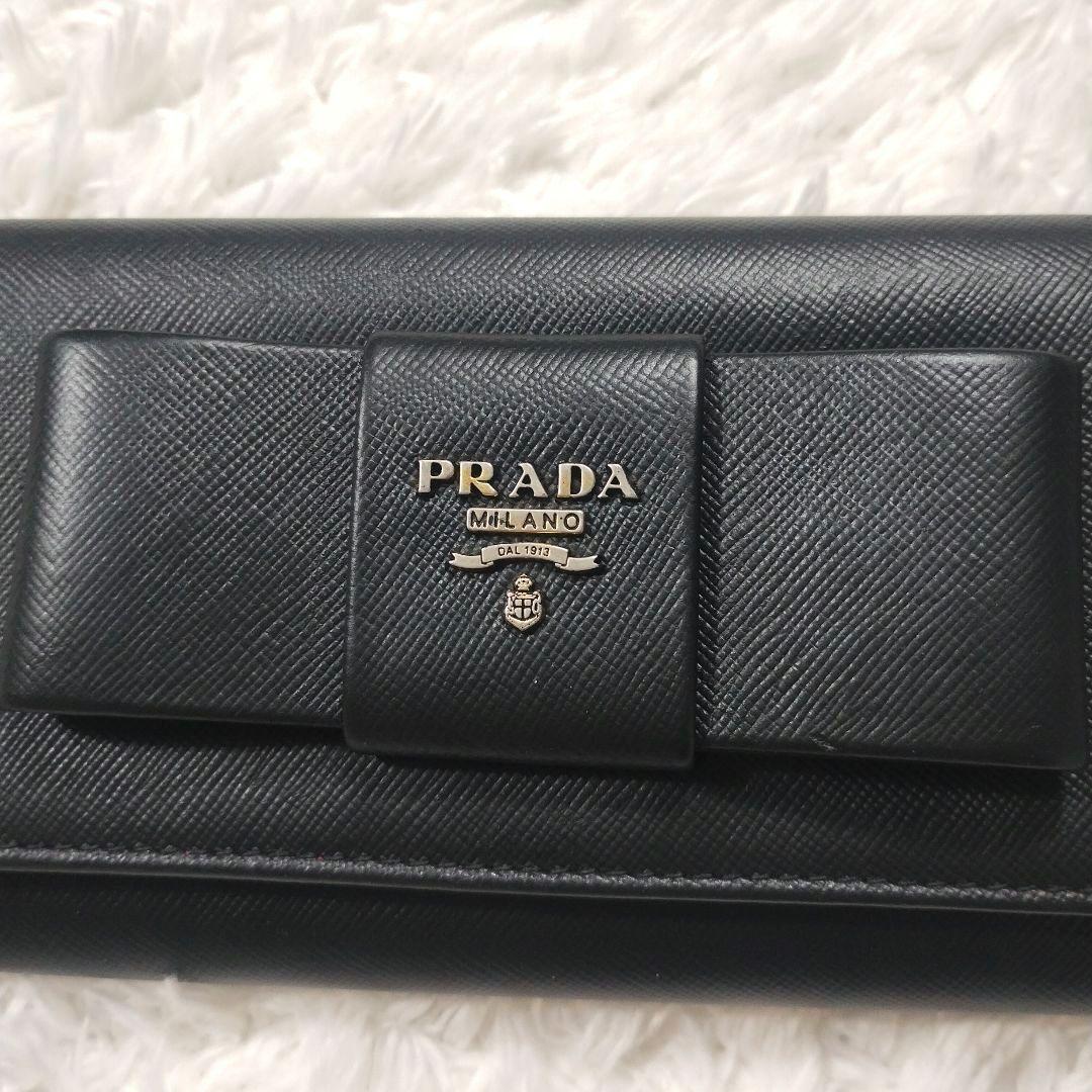 PRADA✨プラダ 長財布 サフィアーノ フィオッコ 黒 メタルロゴ リボン