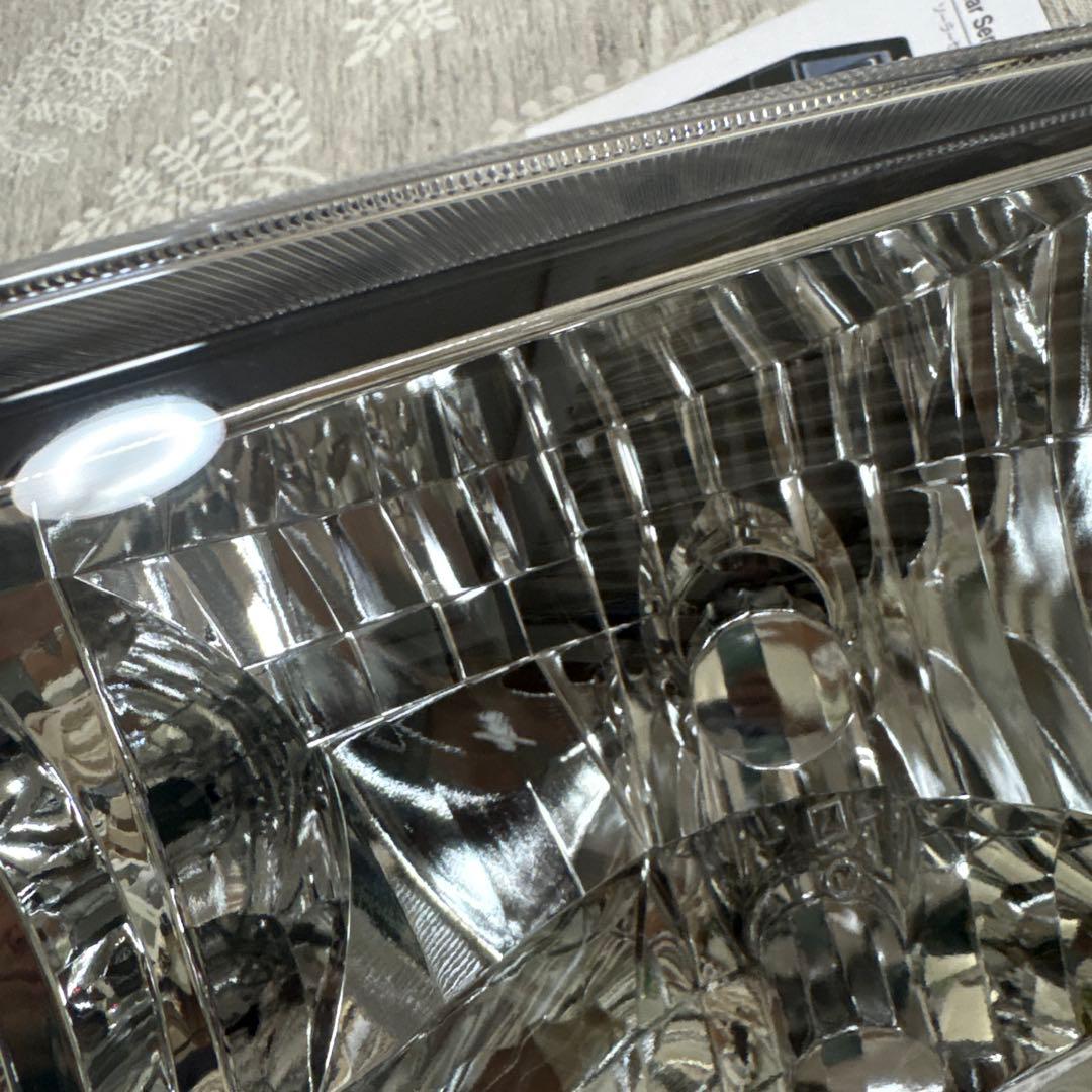 三菱ふそう　ファイター　ヘッドライト　左　ディスチャージ　たもつ