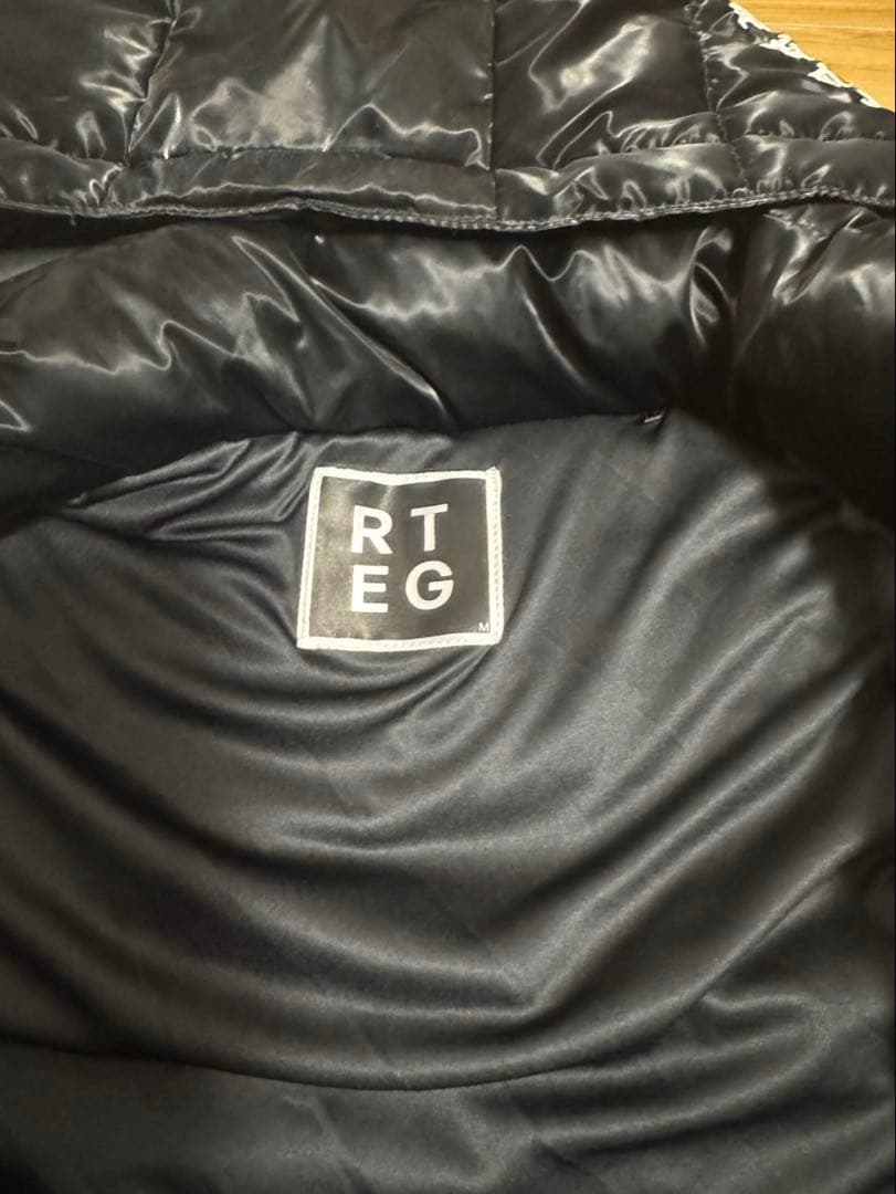 アダムスジャグラー　ダウンベスト