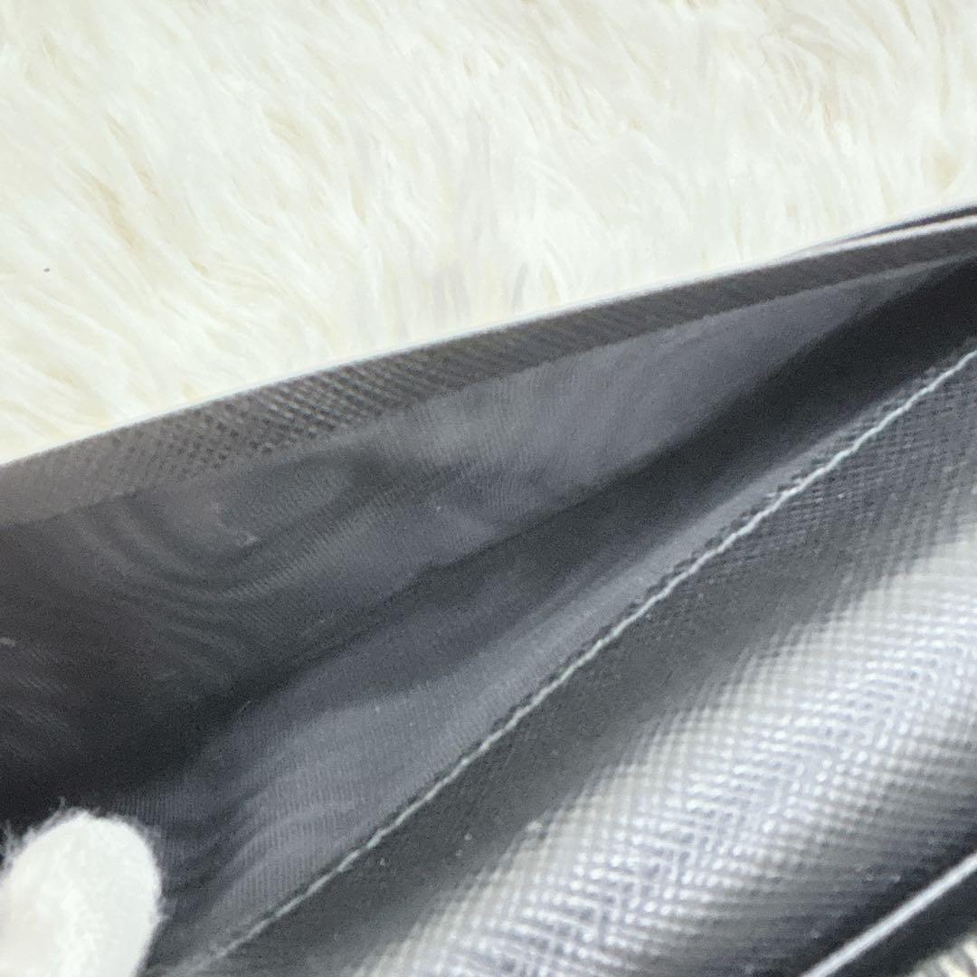 PRADA サフィアーノレザー フラップ 長財布 メタルロゴ ブラック
