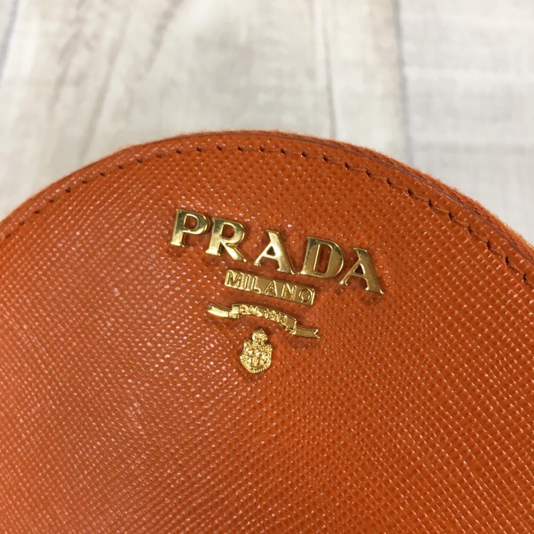PRADA サフィアーノ ケース●オレンジ ラウンド 丸型 1M1443