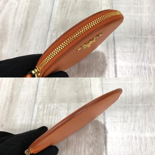 PRADA サフィアーノ ケース●オレンジ ラウンド 丸型 1M1443