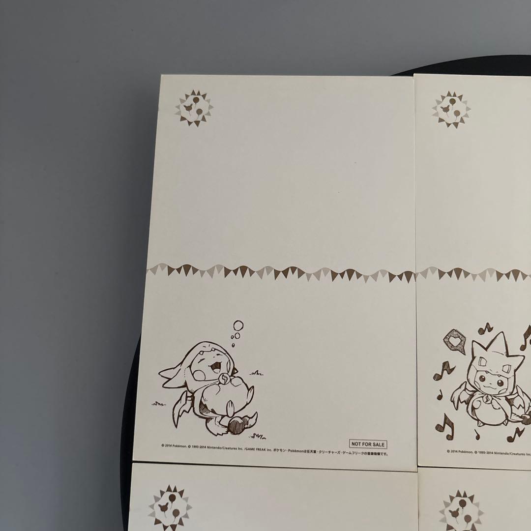 非売品　メガリザードンYのポンチョに身を包んだピカチュウ ポストカード　ポケモン