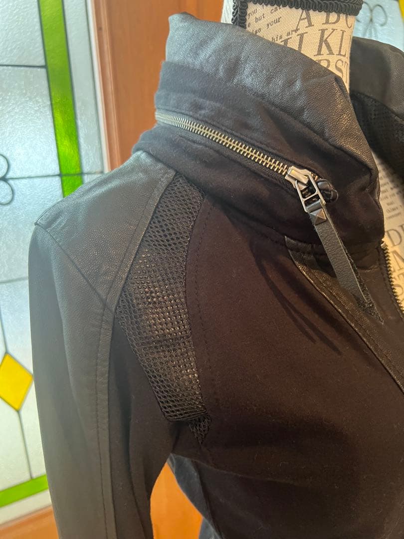 n❣️14th addict❣️レザーとストレッチ素材のハイネックジャケット