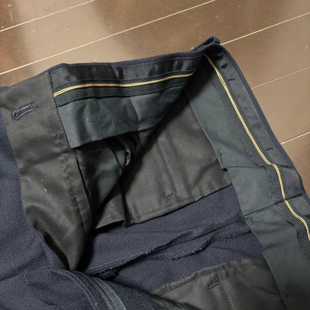 TOMORROWLANDネイビー 2プリーツサイドアジャスターパンツ