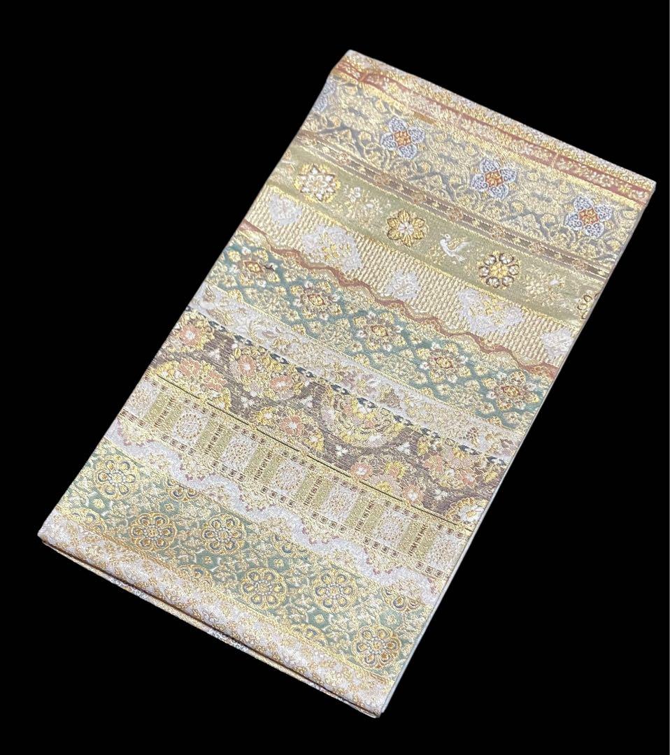 ツーシーズンリバーシブル袋帯 全通柄 正絹 正倉院百彩文 未使用に近いイ6524