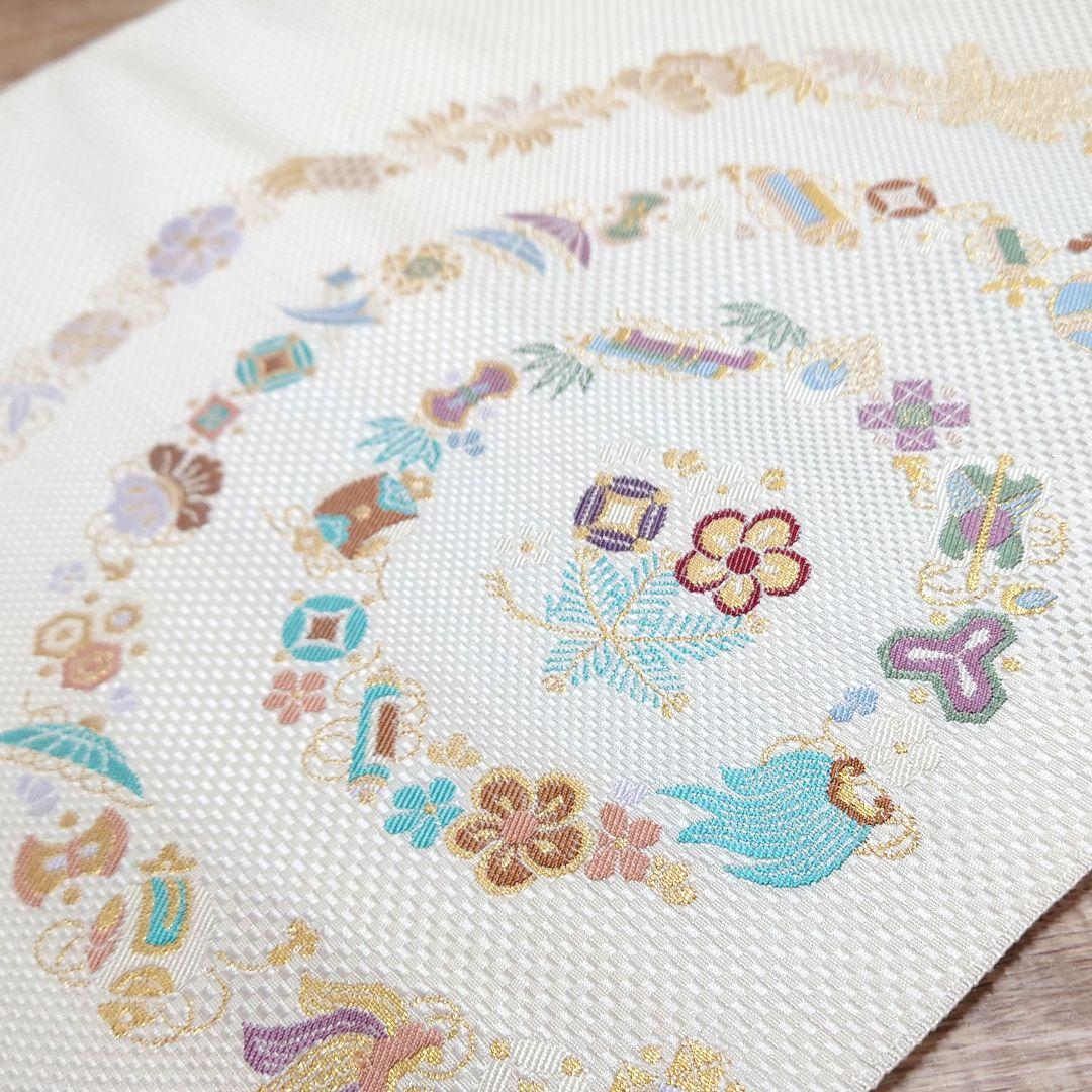 名古屋帯 宝尽くし 円 白 太鼓柄 お仕立て込み