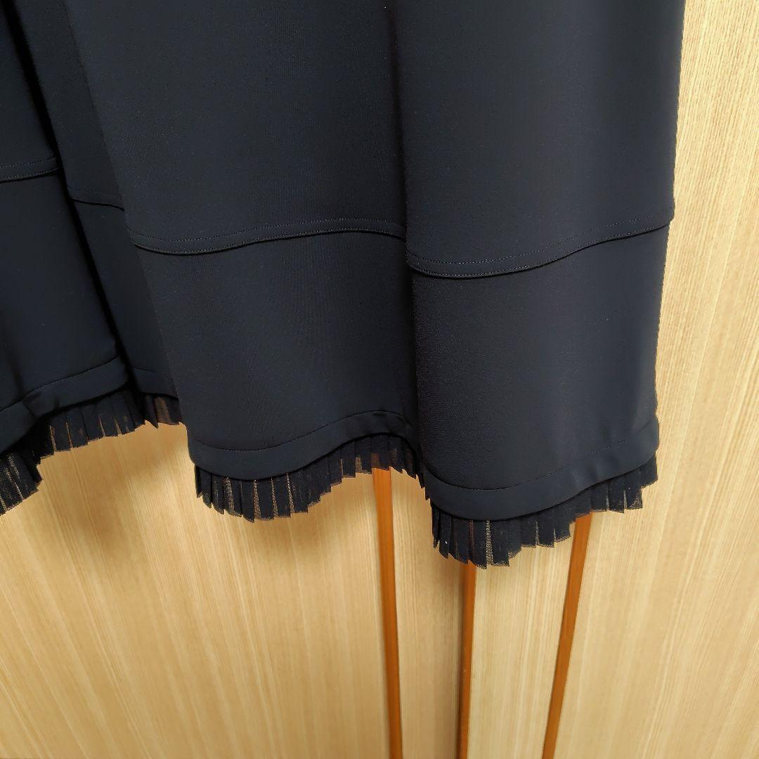 トクコプルミエヴォルの黒チュニックワンピース