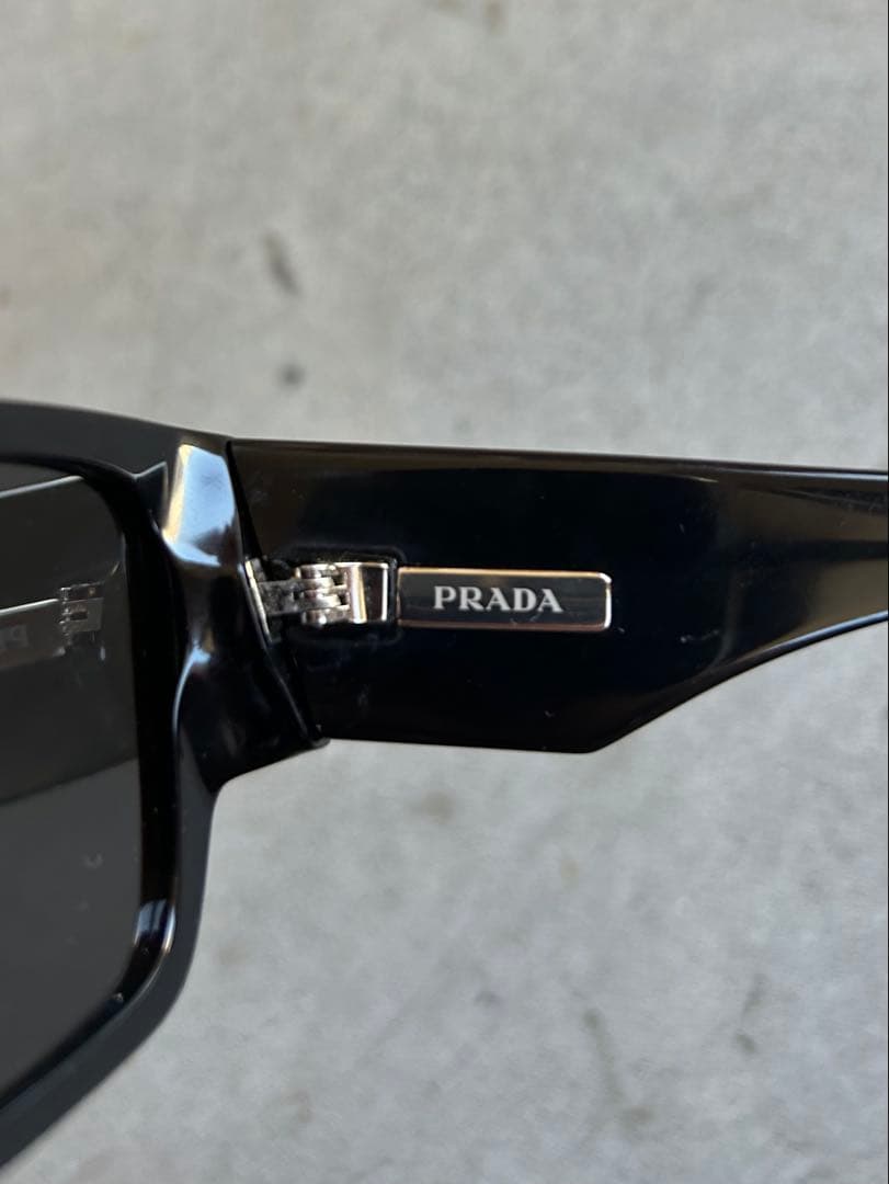 Prada Triangle Logo Sunglasses “Black”