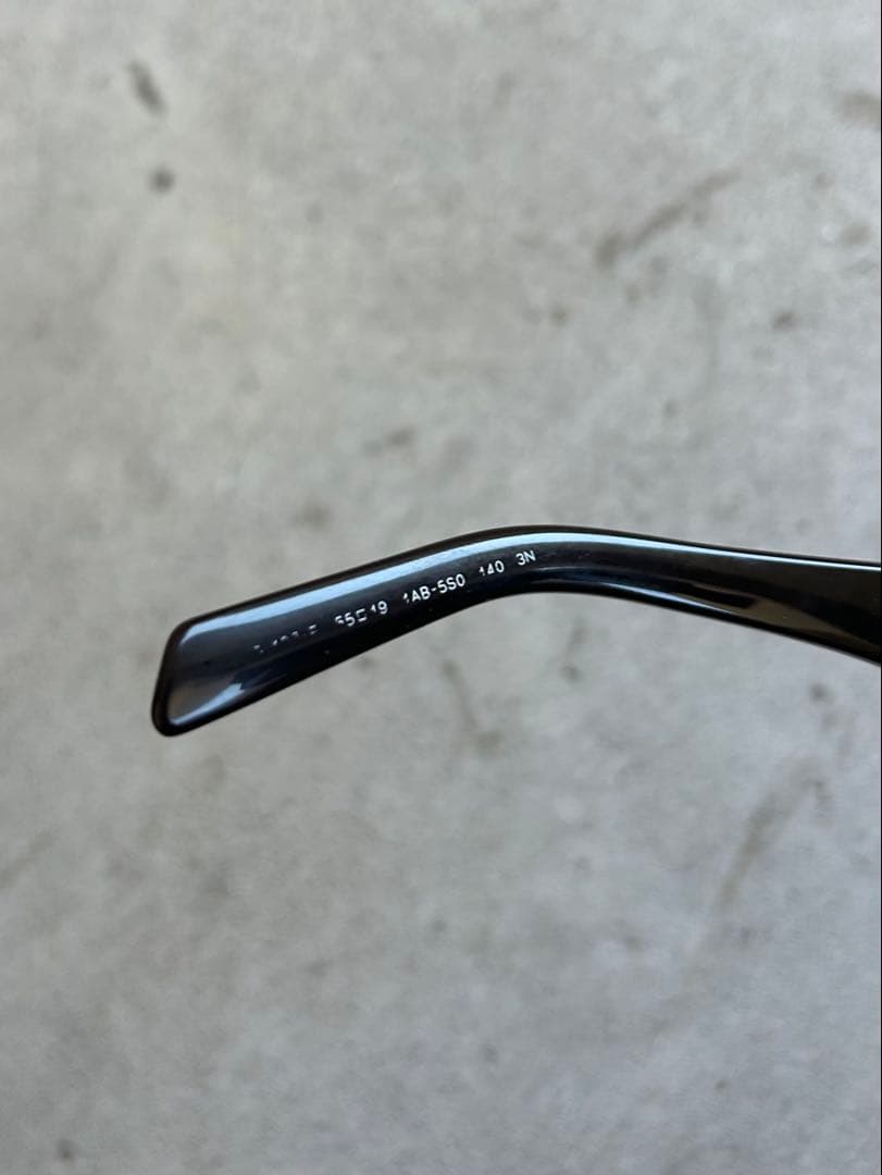 Prada Triangle Logo Sunglasses “Black”