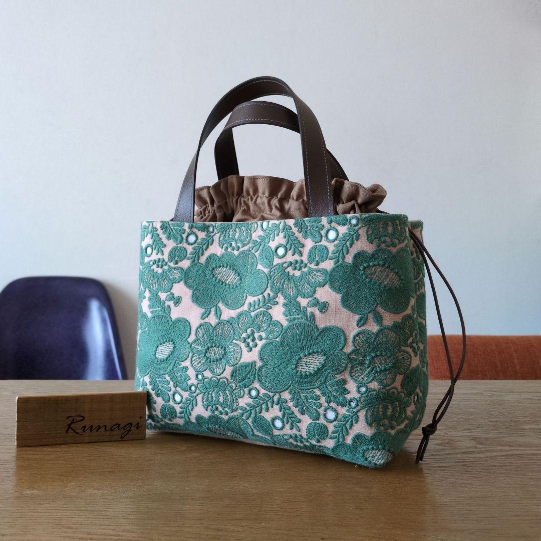 【1570】あおりポケットの巾着バッグ＊ミナペルホネン