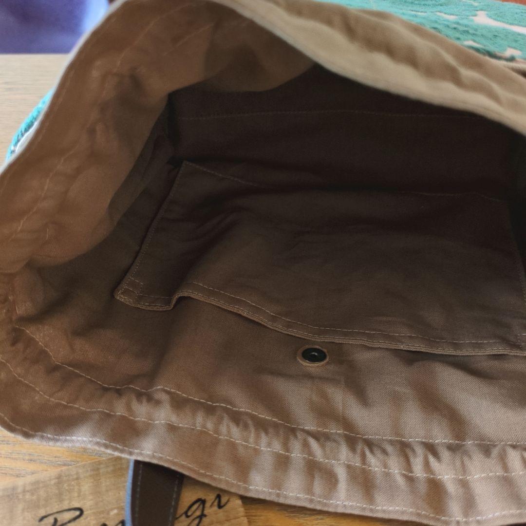 【1570】あおりポケットの巾着バッグ＊ミナペルホネン