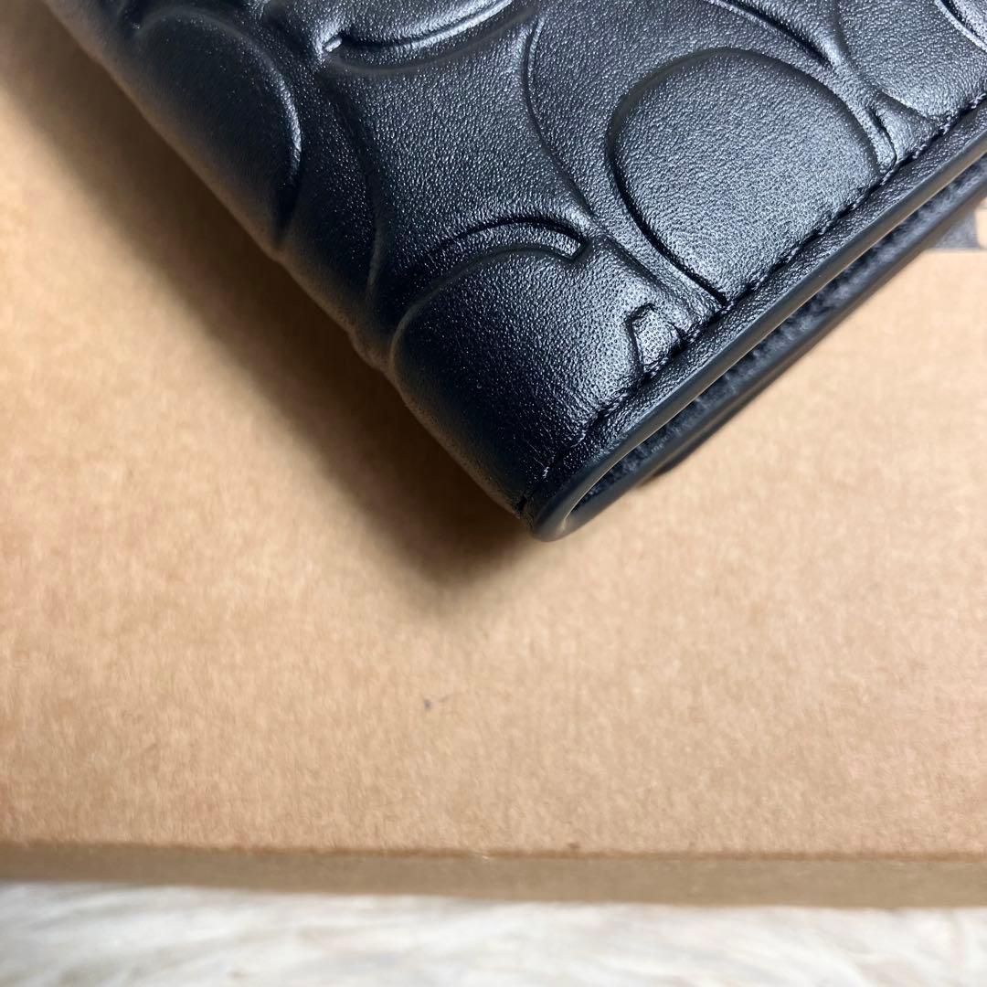 未使用品 COACH エンボス シグネチャー キーケース レザーブラック