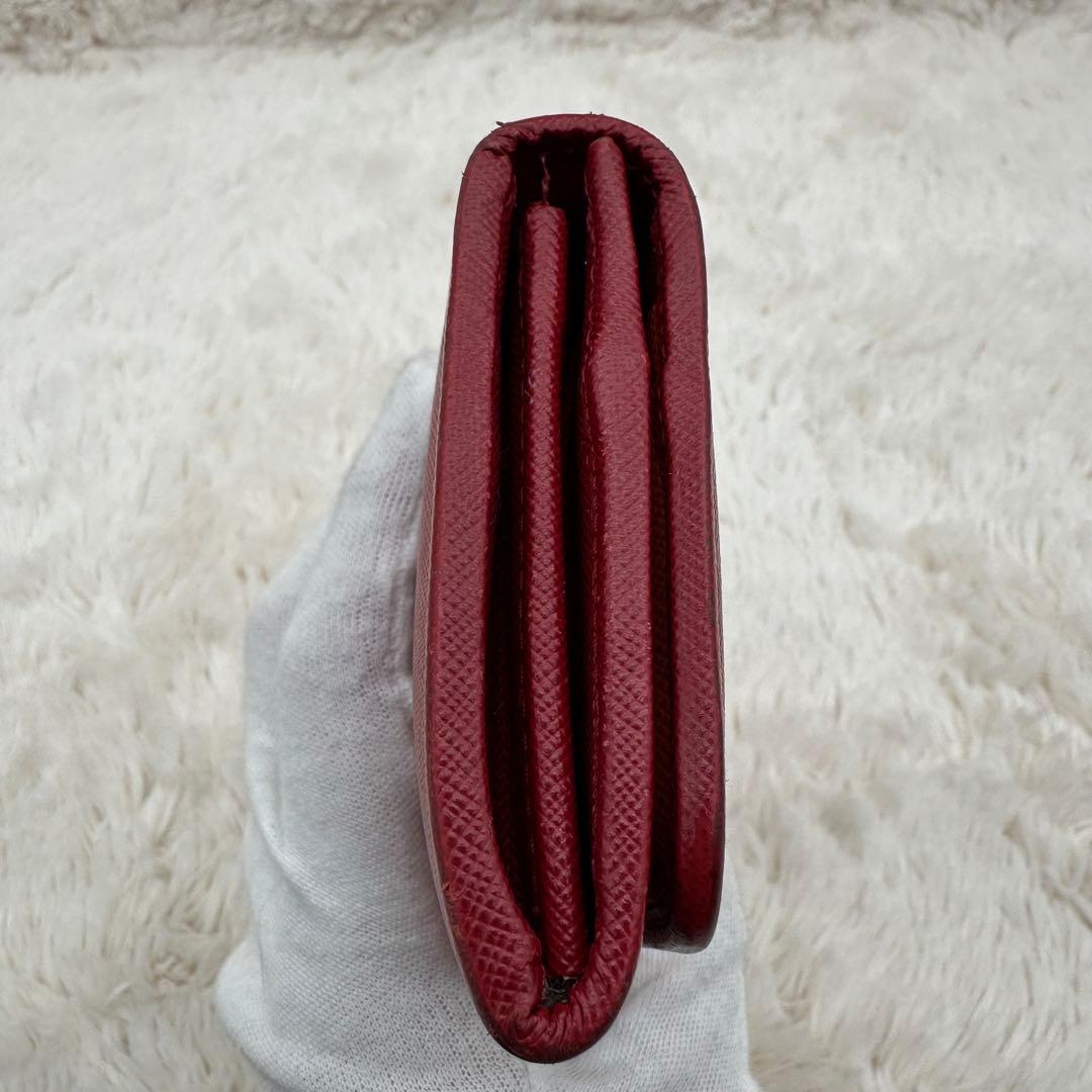 ✨美品✨プラダ　長財布　メタルロゴ　バイカラー　サフィアーノレザー　赤　オレンジ