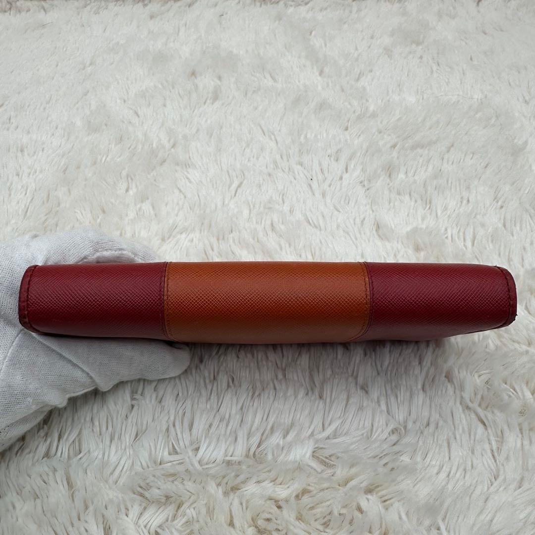 ✨美品✨プラダ　長財布　メタルロゴ　バイカラー　サフィアーノレザー　赤　オレンジ