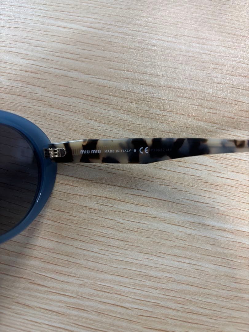 ミュウミュウ サングラス miumiu SMU01UA 1183A0