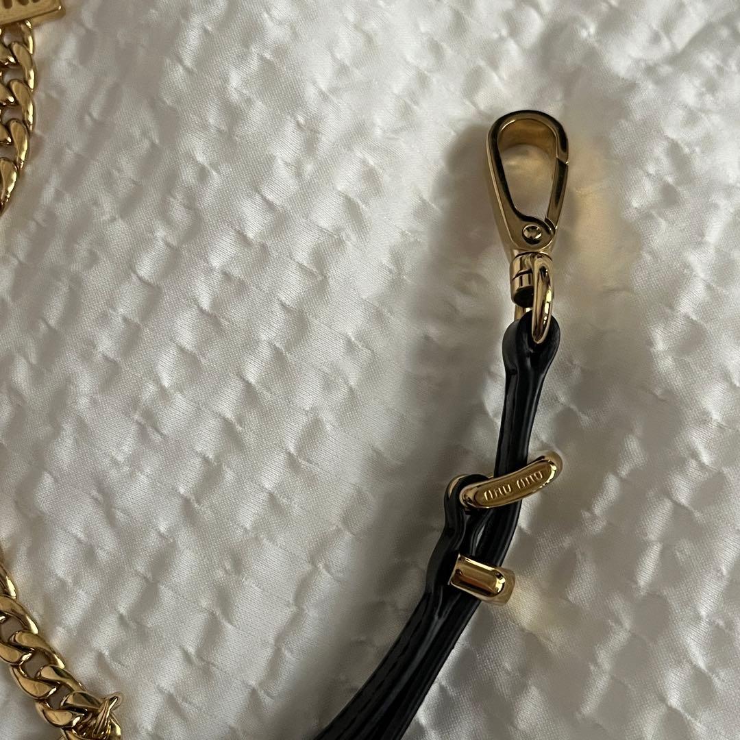 miumiuレザーxコードxメタル トリック バッグチャーム