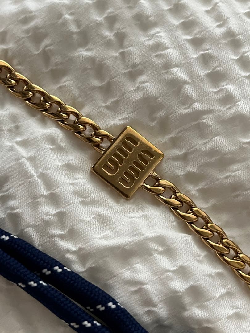 miumiuレザーxコードxメタル トリック バッグチャーム