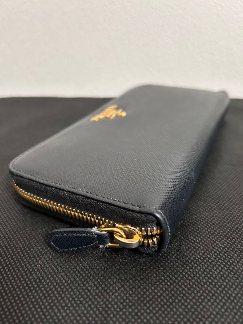 プラダ ラウンド 長財布 レディース サフィアーノ メタル ブラック