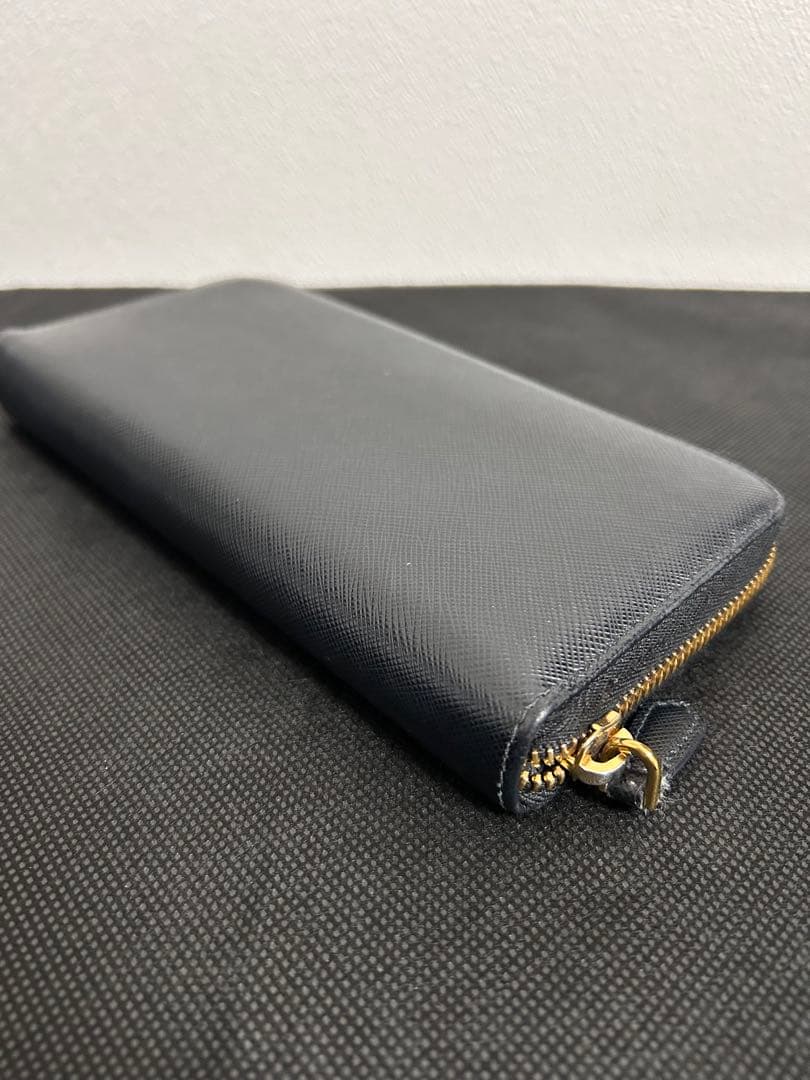 プラダ ラウンド 長財布 レディース サフィアーノ メタル ブラック