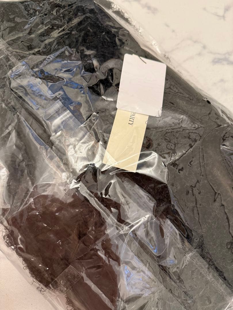 カールボア長袖ペプラムトップス