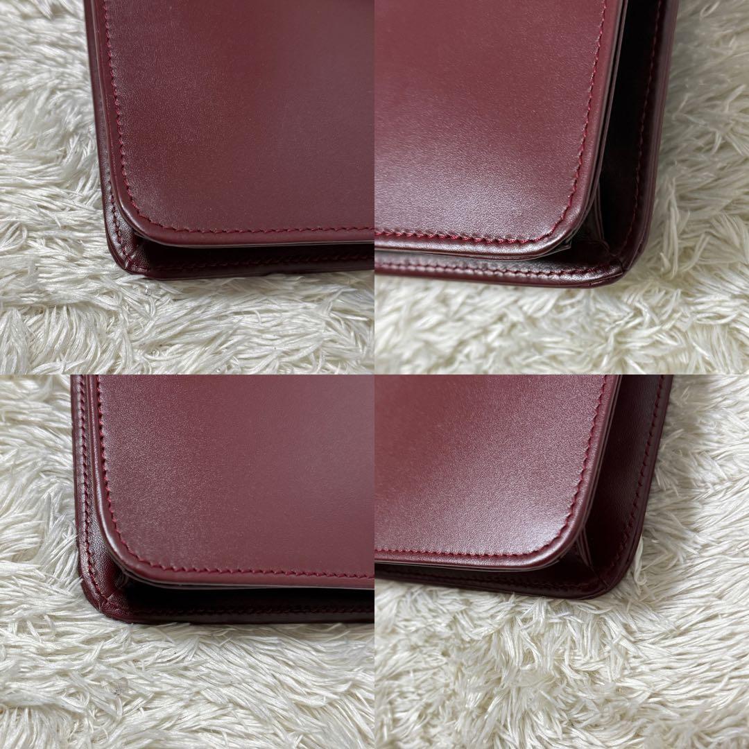 カルティエ　Cariter　マストライン　クラッチバッグ　ボルドー　ロゴ金具