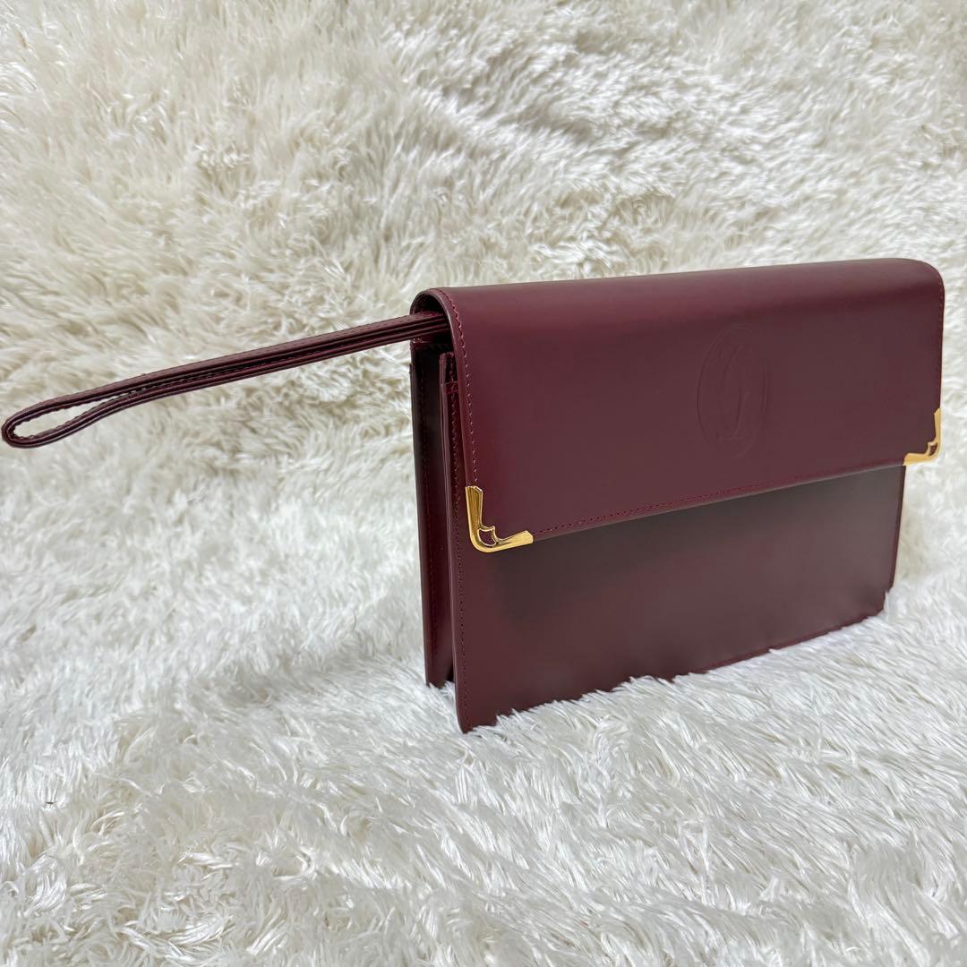 カルティエ　Cariter　マストライン　クラッチバッグ　ボルドー　ロゴ金具