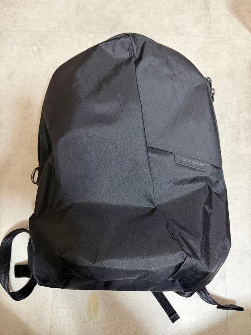 バッグ ABLE CARRY Thirteen Daybag X-Pac Black