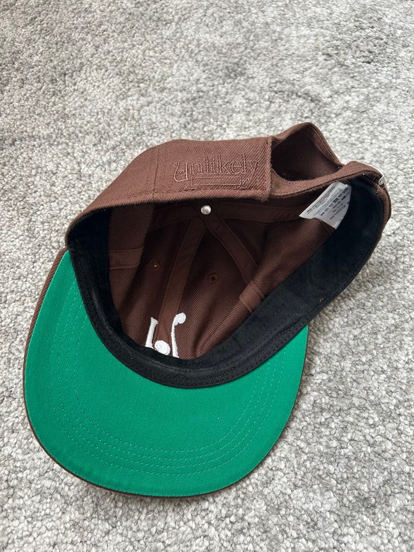 unlikely× nepenthes ベースボールキャップ