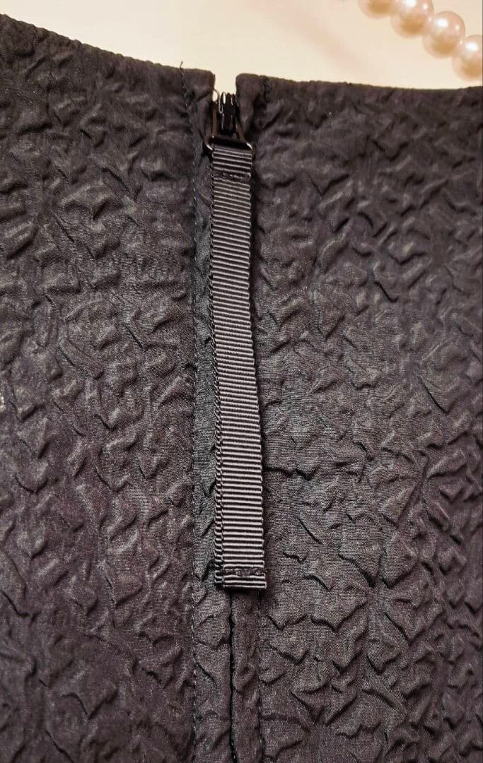 【新品タグ付】スーパービューティー エンボス リボン チュニック 黒 44 LL