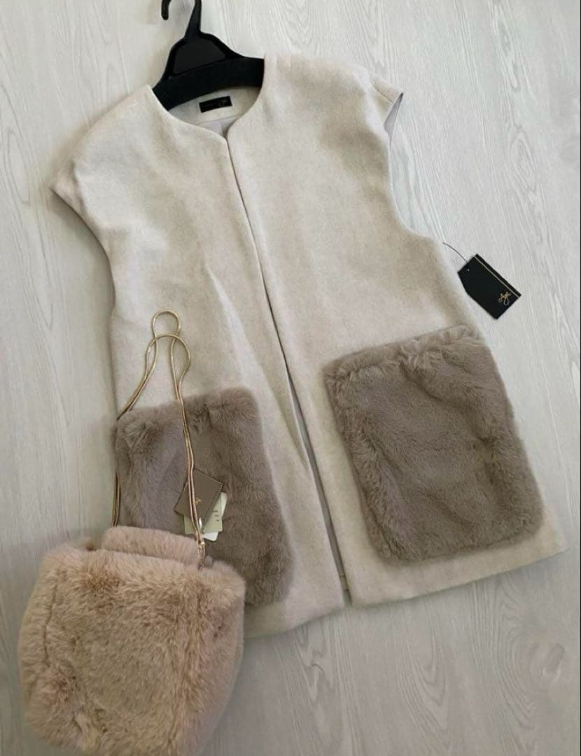 おまとめでお値下げ34000円新品♡スコットクラブ購入ベストジレ表地ウール100