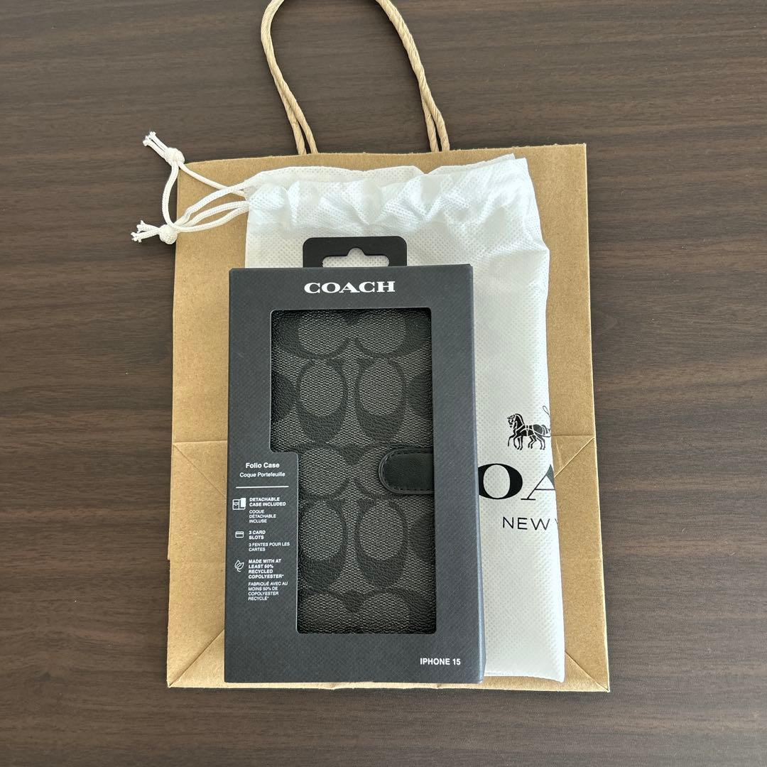 ①【新品】COACH レザー iPhone 15 ケース　手帳型スマホケース