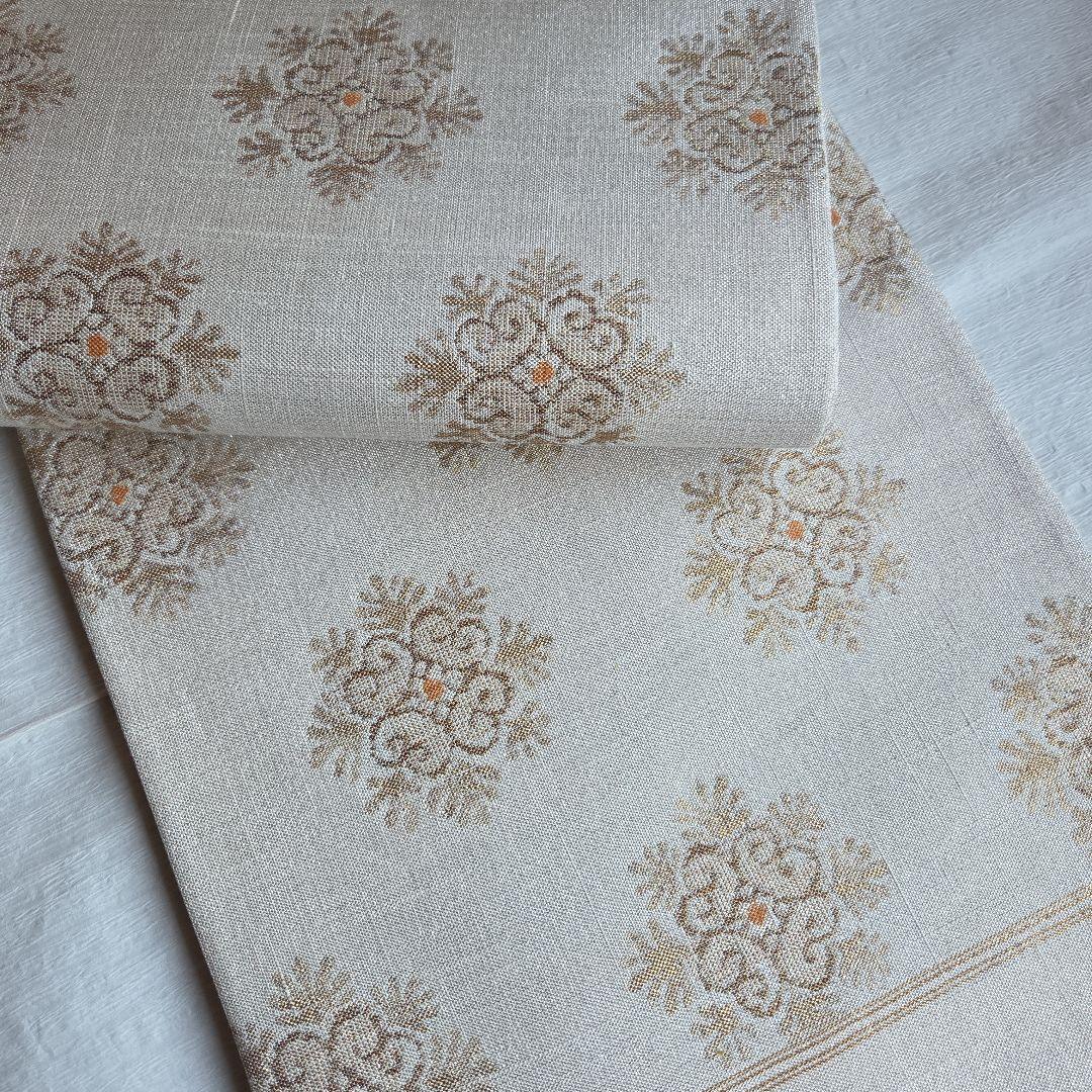 上品な織と煌めき　華文様の袋帯