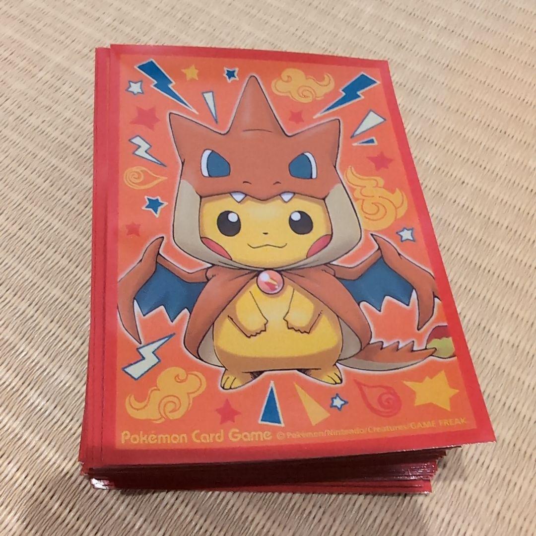 メガリザードンYのポンチョを着たピカチュウ　デッキケース　スリーブ