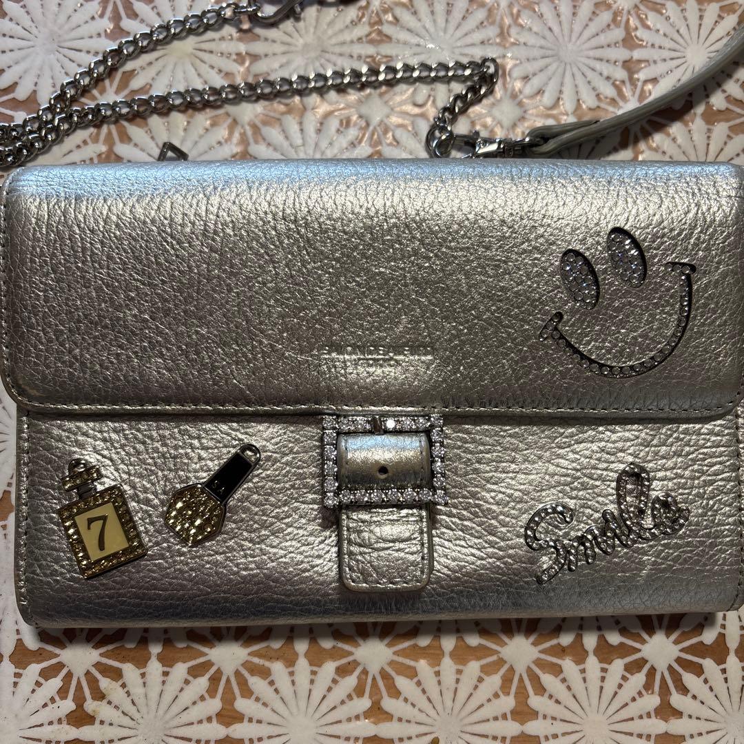 シルバー スマイルマーク クラッチバッグ