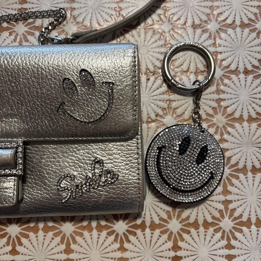 シルバー スマイルマーク クラッチバッグ