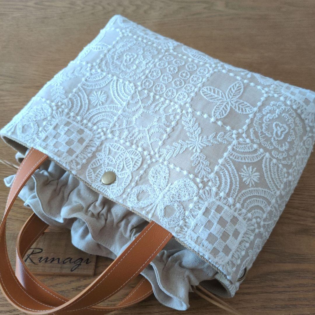 あおりポケットの巾着バッグ＊ミナペルホネン foresttile