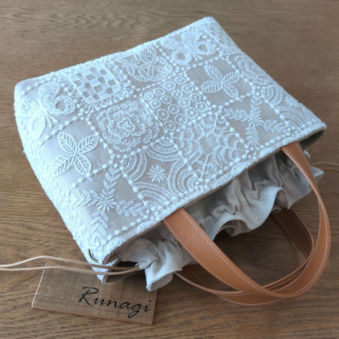 あおりポケットの巾着バッグ＊ミナペルホネン foresttile