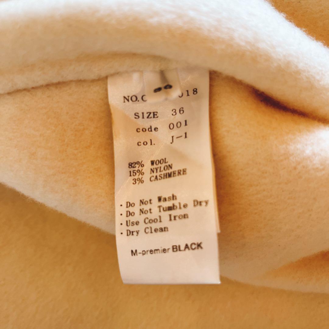 mid. エムプルミエ　ブラック ノーカラーフレアケープコート　アイボリー