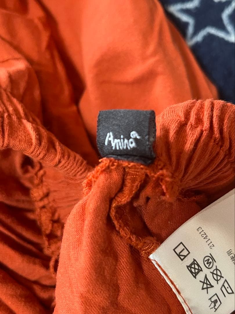 オレンジ サルエルパンツ