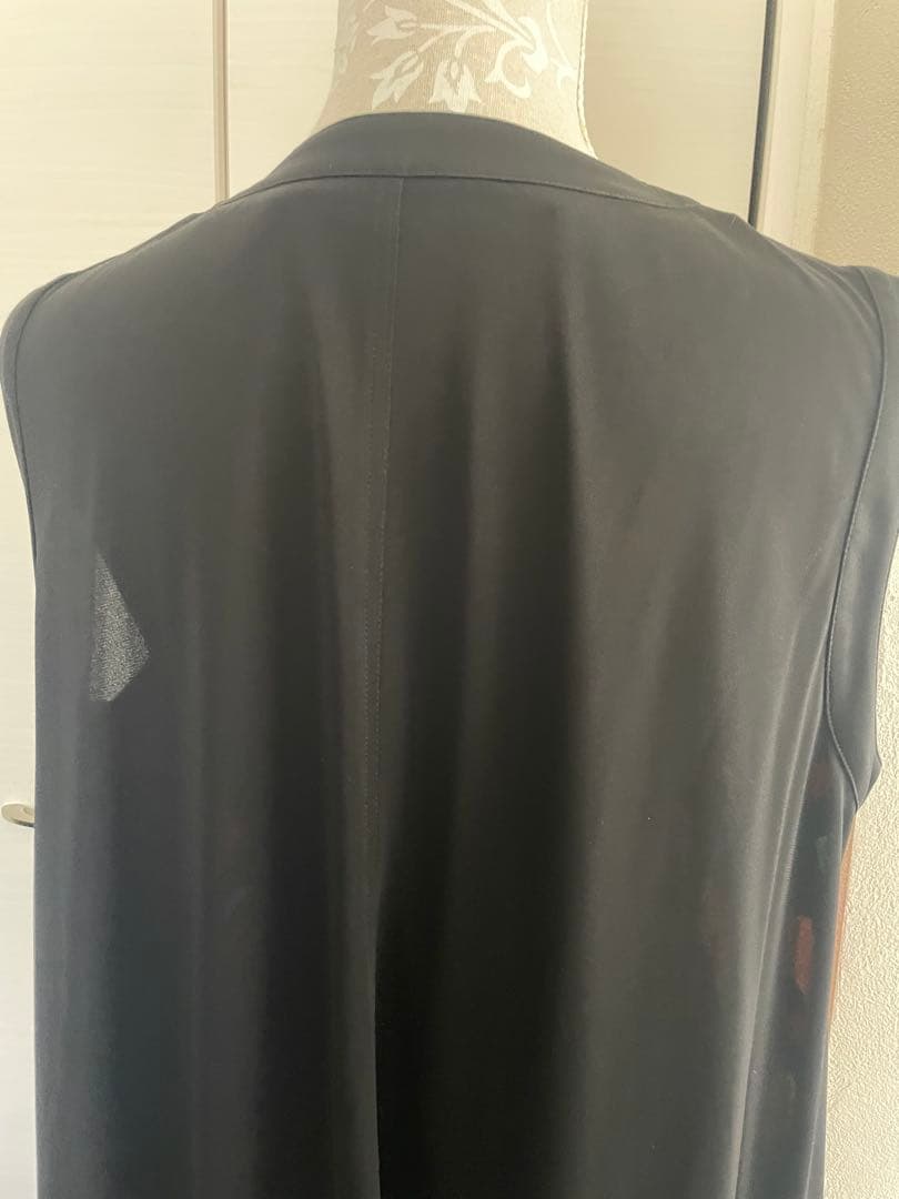 トクコプルミエヴォル/多色幾何学模様ノースリーブチュニックジレ