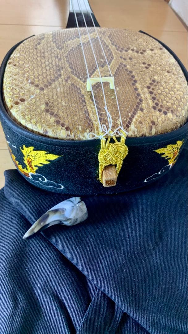 三線 沖縄 両面蛇皮 表側強化二重張り カラクイ1本弦2本新品交換