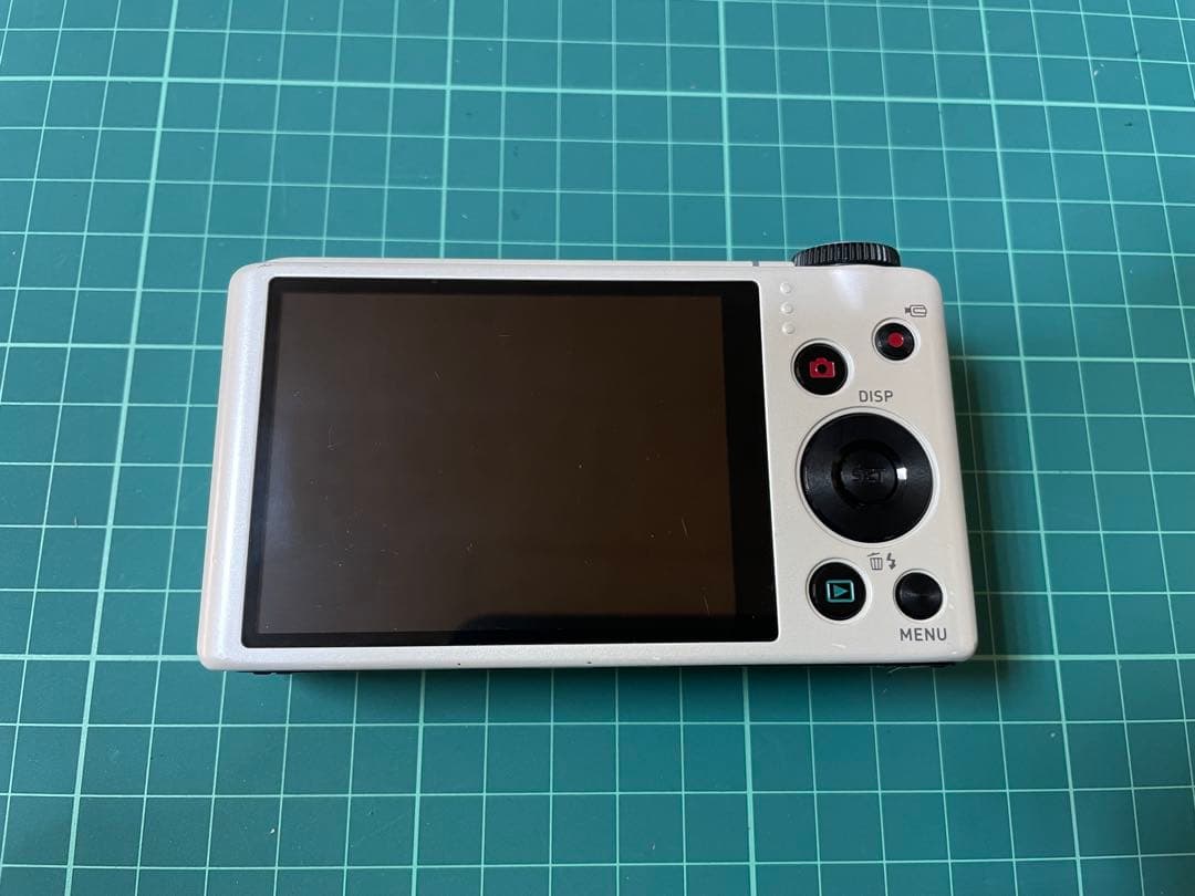 CASIO EXILIM EX-ZR100 ホワイト [電池挿入ふたロック不良]