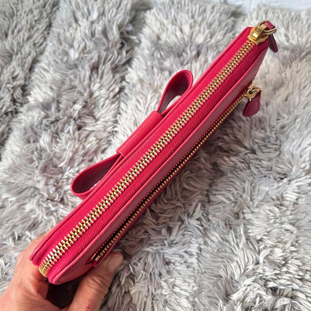 美品✨プラダ　L字ファスナー　サフィアーノ　長財布　フィオッコ　リボン　ピンク