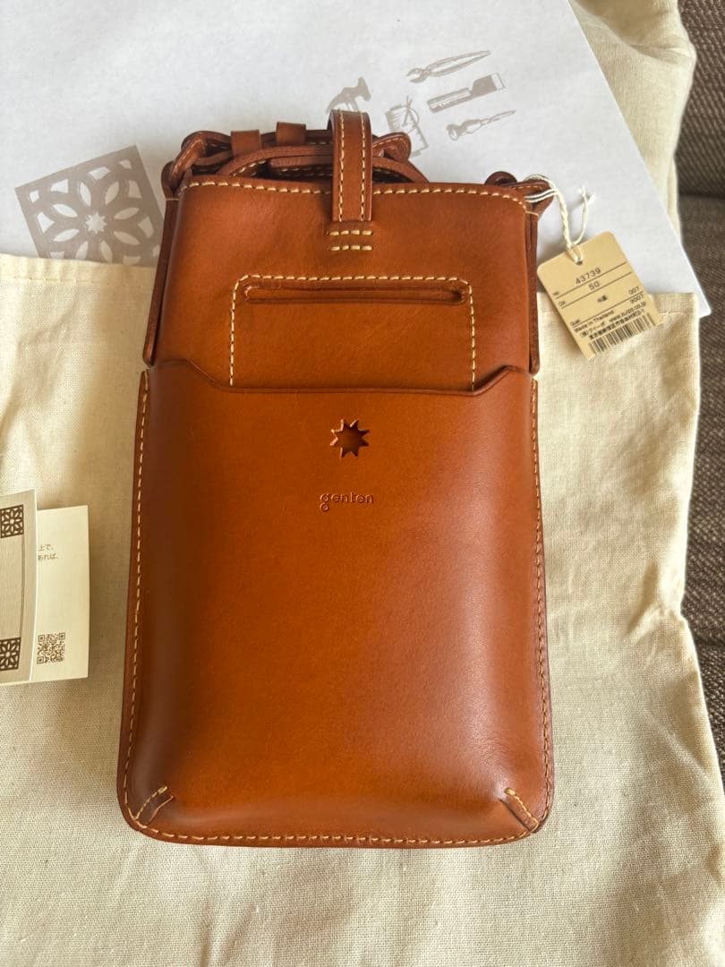 ゲンテン　genten カットワークレザー スマホショルダーバッグ ブラウン