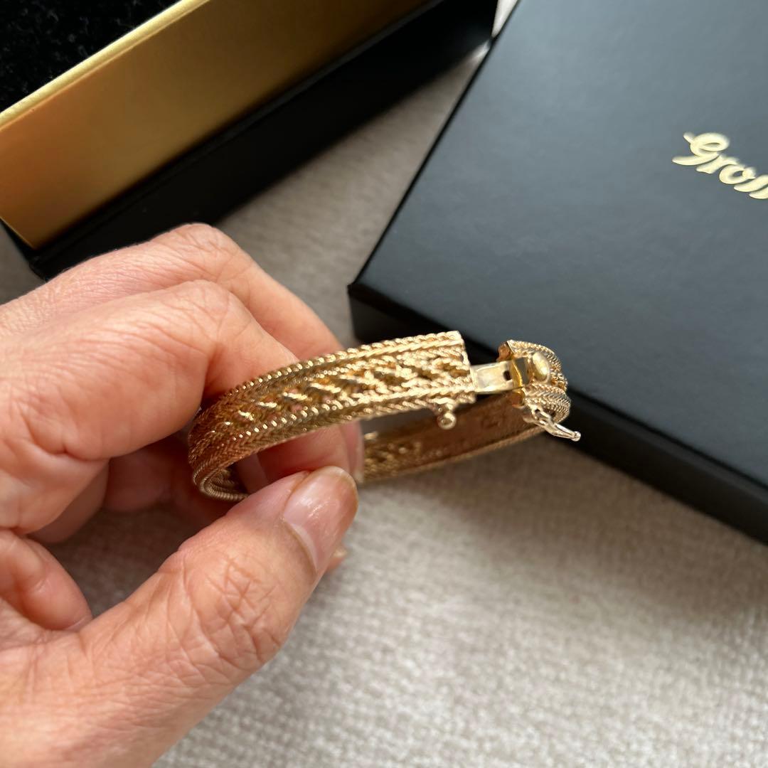 グロッセ　ゴールド 編み込みデザイン バングル