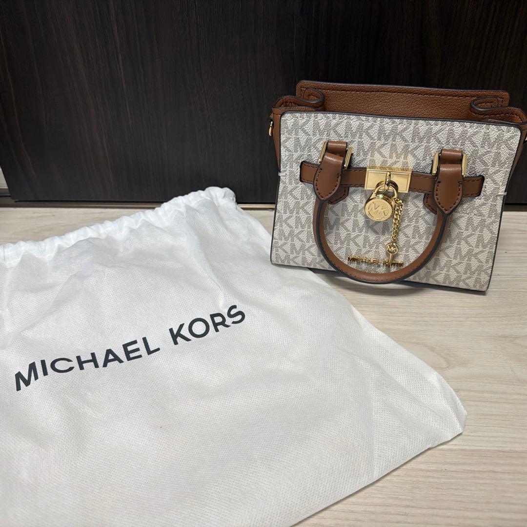 マイケルコースサッチェル クロスボディ エクストラスモール - MKシグネチャー