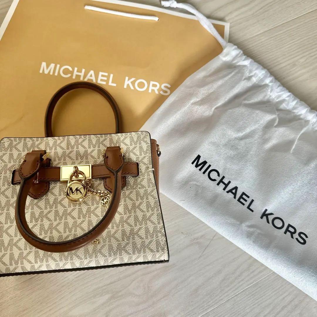 マイケルコースサッチェル クロスボディ エクストラスモール - MKシグネチャー
